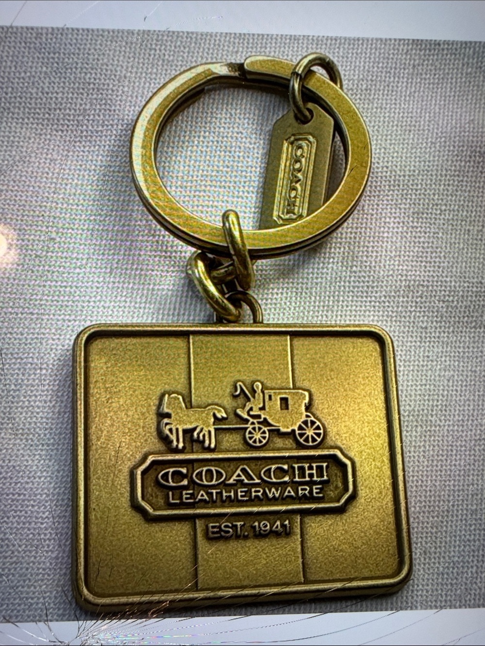 Coach Brass-Tone Horse & Carriage Leather ware Square Key Ring with Coach tag